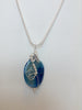 Sterling Silver Wrapped Pendant - Oval Blue Quartz Stone